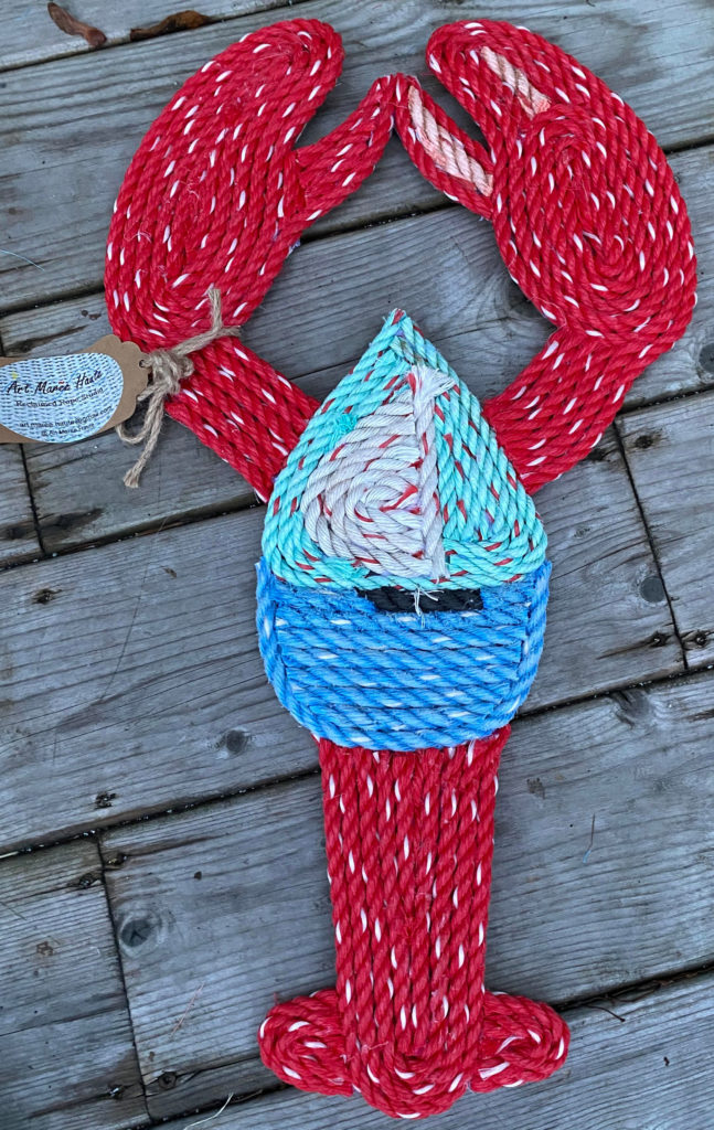 photo of lobster-shaped mat made from fishing rope